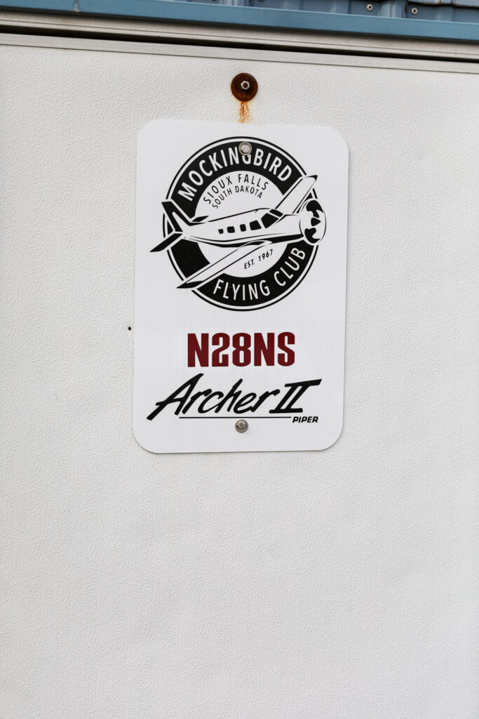 N28NS Mockingbird Flying Club placard